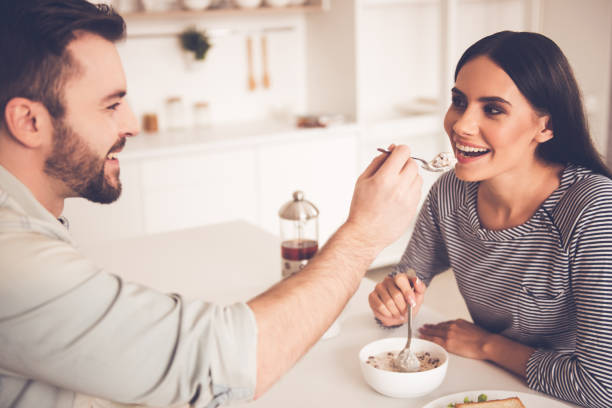 istock Beautiful couple in kitchen 661884266