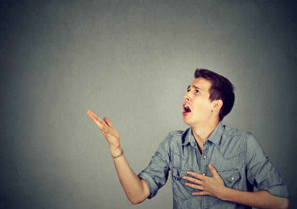 istock Desperate man screaming asking for help forgiveness 661885760