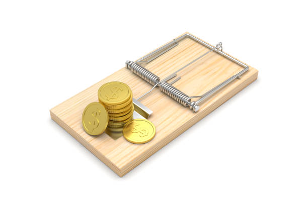 istock Mousetrap with Coins, isolated on white background 661885910
