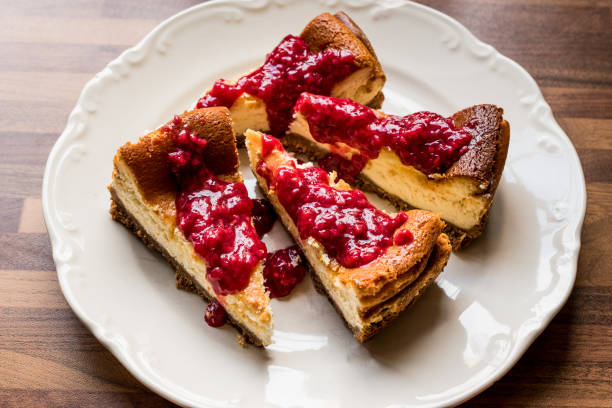 istock Homemade Raspberry Cheesecake in white plate. 661887890