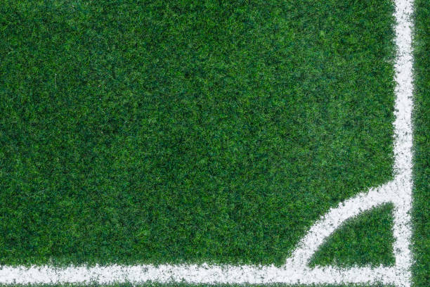 istock green Soccer Field with white lines and corner 661890488