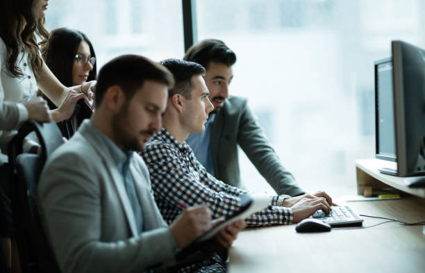 istock Business colleagues at information technology company offices 661897070