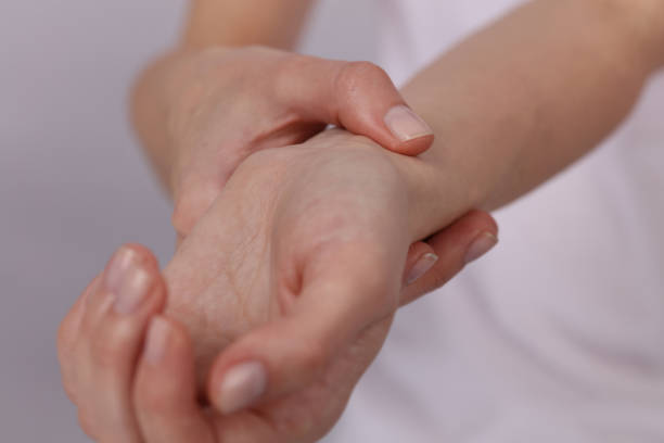 istock Woman hands checking heart rate pulse on wrist close up 661898340