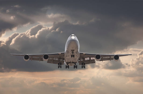 istock Jumbo jet airplane landing 661899312