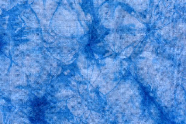 istock Dyed indigo fabric background and textured 661911990