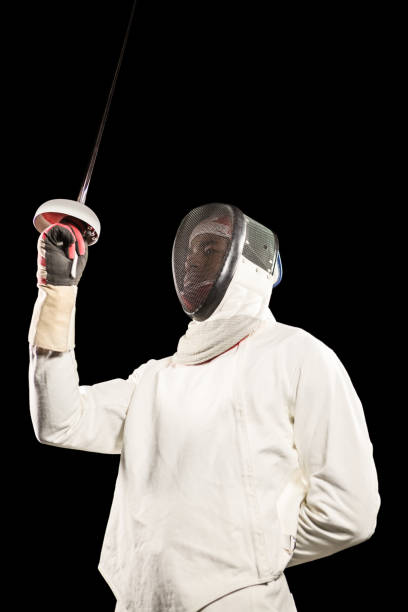 istock Man wearing fencing suit practicing with sword 661912278