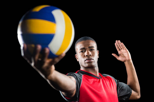 istock Sportsman playing a volleyball 661922180