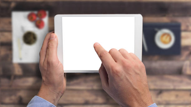 istock Knolling business hipster man holding tablet 661922950