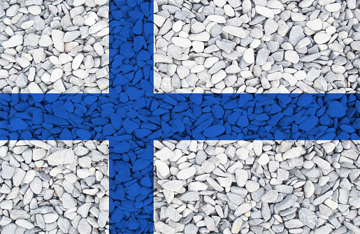Flag of Finland painted on stones in nature