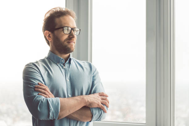 istock Handsome businessman in office 661963506