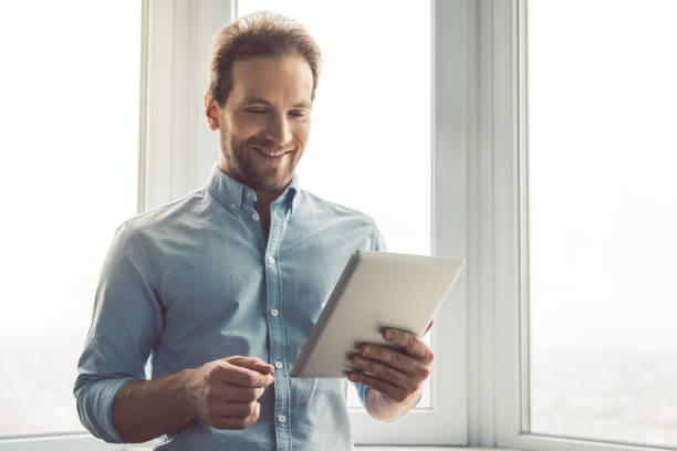 istock Handsome businessman in office 661964474
