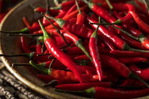 istock Raw Organic Red Thai Peppers 661969692