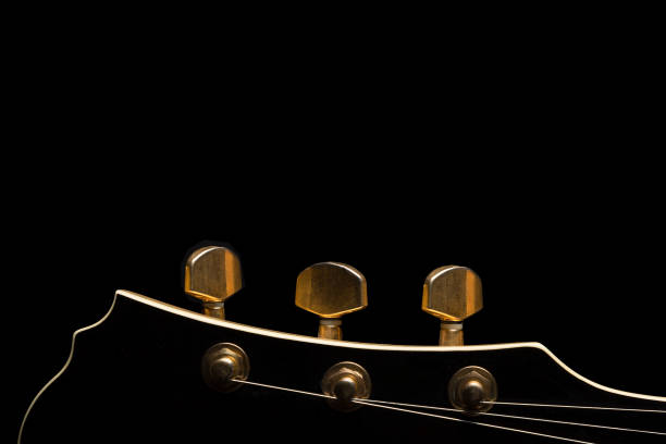 istock Guitar headstock on black background 661978582