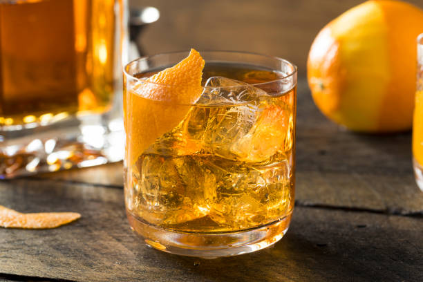 istock Boozy Homemade Old Fashioned Bourbon on the Rocks 661979310