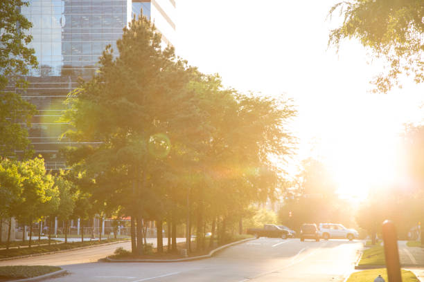 istock Sunset on downtown city road with skyscraper. 661989112