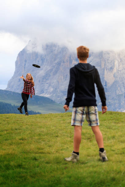 istock Adventures on the Dolomites: playing frisbee 662030688