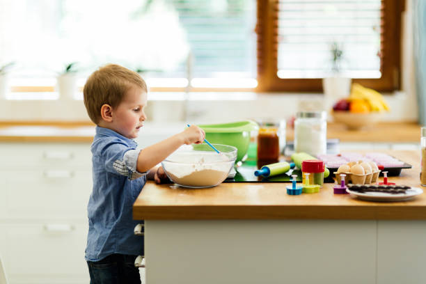 istock Cute child learning to become a chef  since the age of 2 662032958