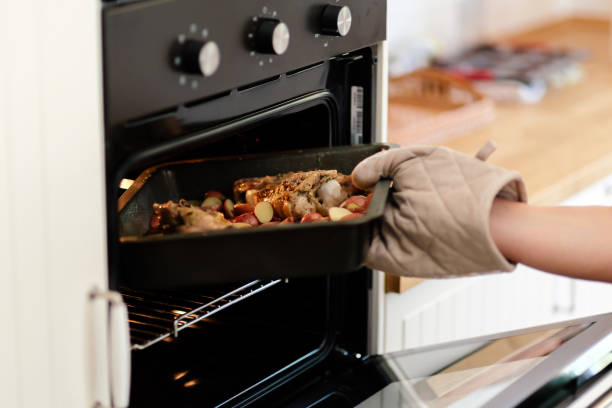 istock Meat and potatos being done in oven 662040988