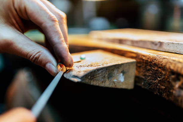istock Jeweler creating jewelry 662051278