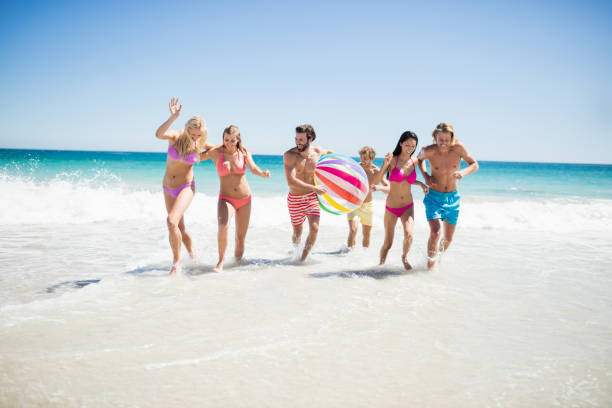 istock Friends having fun at the beach 662052000