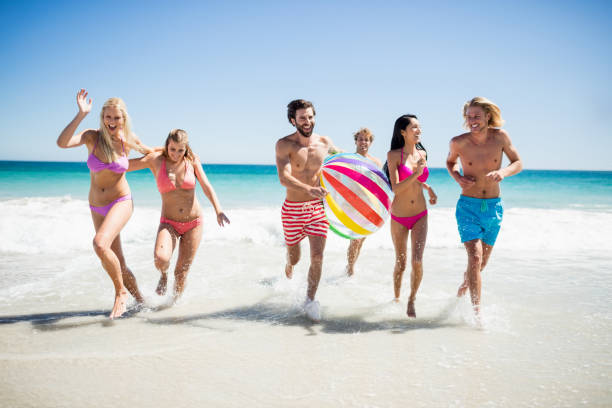istock Friends having fun at the beach 662056934
