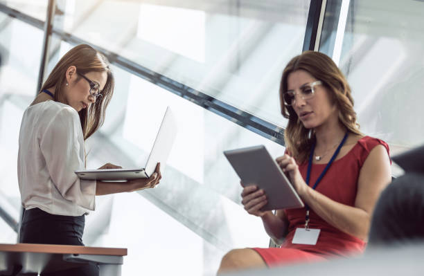 Business People on a Conference Event Discussing