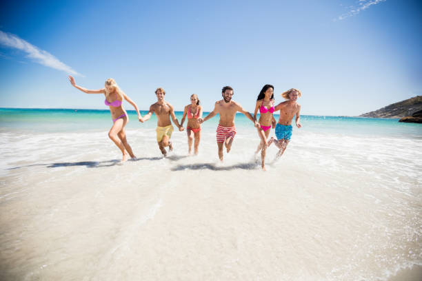 istock Friends having fun at the beach 662062162