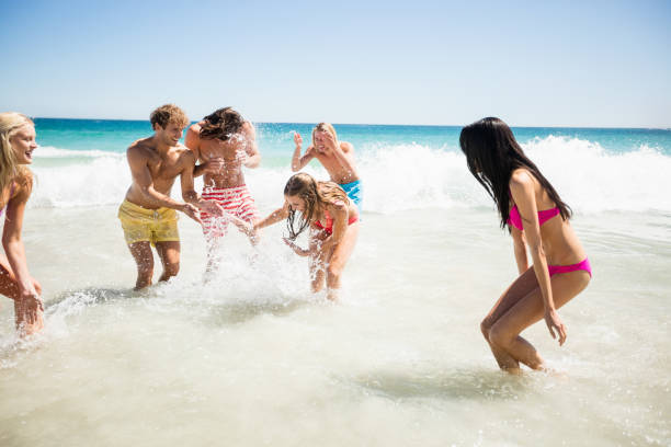 istock Friends having fun at the beach 662071072