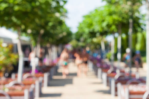istock Defocused and blurred image. People walk in the park 662097402