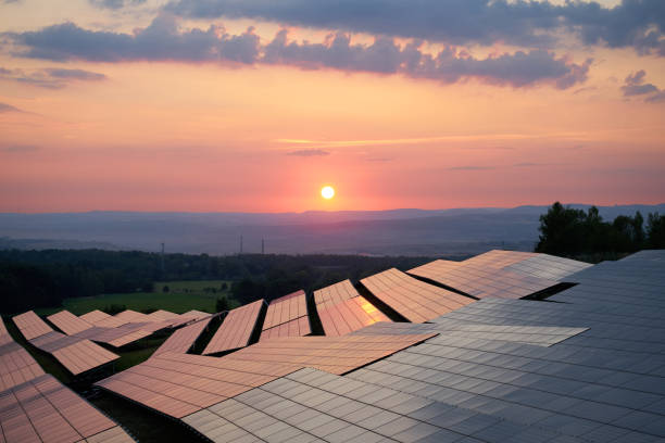 istock Sunset over solar power station in countryside. View from above. 662105308