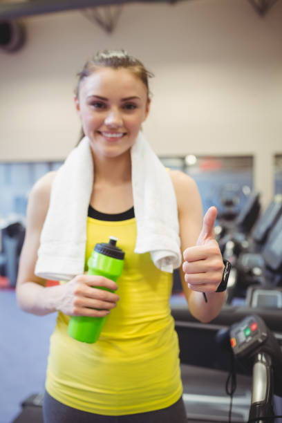istock Fit woman using the treadmill 662125550