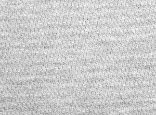 Heather gray cotton sweater knitted fabric texture Heather gray cotton sweater knitted fabric texture heather photos stock pictures, royalty-free photos & images