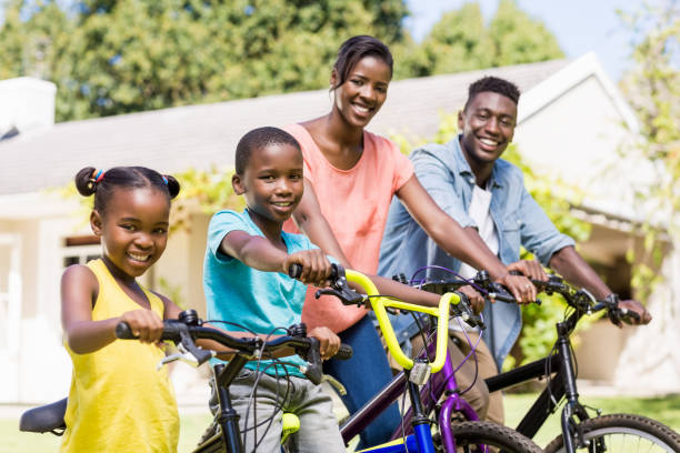 istock Happy family doing bicycle 662160290