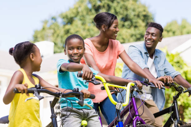 istock Happy family doing bicycle 662164560