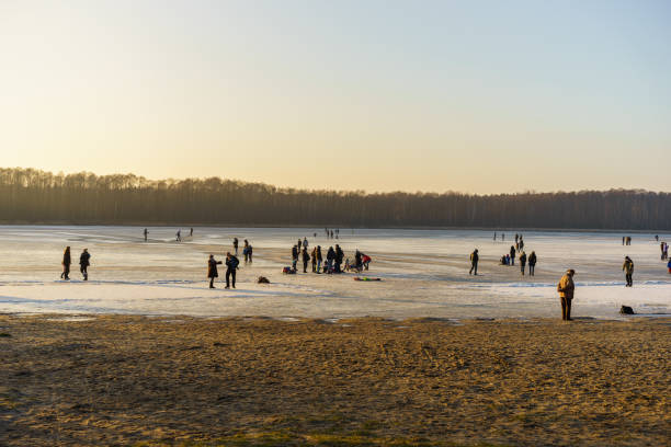 istock sunset over a frozen lake 662166774