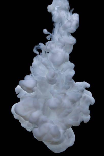 istock White acrylic paint in water. 662168430