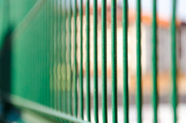 istock A perspective view of iron jail cell bars 662172196