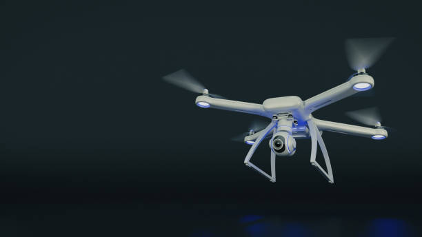istock drone, quadrocopter, with photo camera flying in the blue sky. 662198932