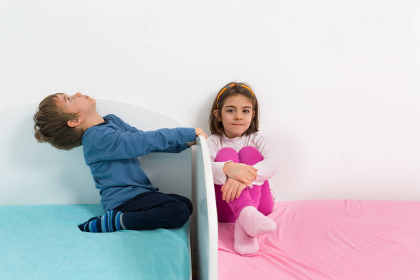 Play Time Cute little brother and sister playing in their room blue brothers stock pictures, royalty-free photos & images