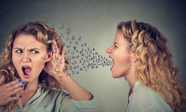 istock Split personality. Angry woman screaming at scared shocked herself 662228002