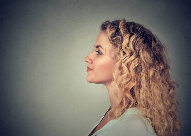 istock Side profile portrait of a pretty happy woman, smiling 662228310
