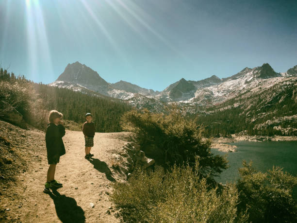 children play in the mountains on a beautiful day