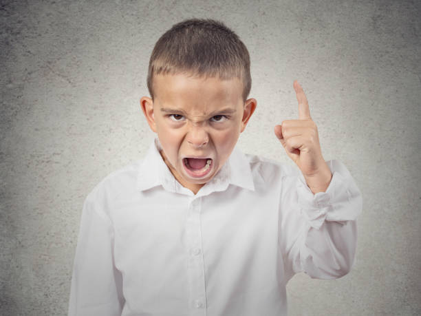 istock Closeup Headshot side view Portrait Angry Child Screaming 662268254