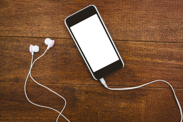 istock View of a black smartphone with white headphones 662274834