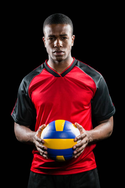 istock Sportsman holding a volleyball 662310258