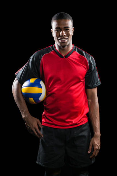 istock Sportsman holding a volleyball 662318324