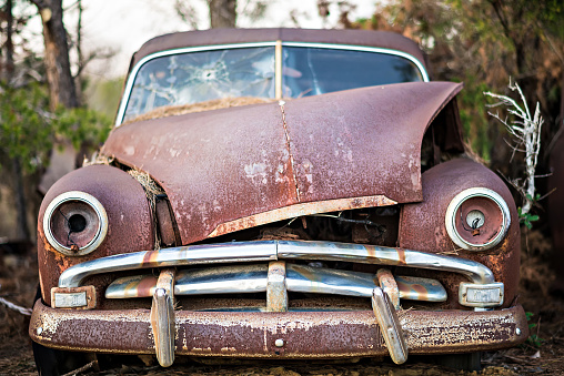 Abandoned old rusty car