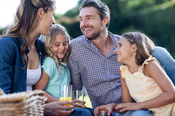 istock Happy family having a picnic 662435594