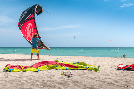 Miami Beach, USA - March 31, 2017: Kiteboard school instructor at Miami Beach shoreline