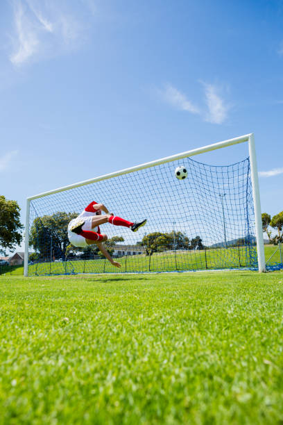 istock Football player scoring a goal 662454446